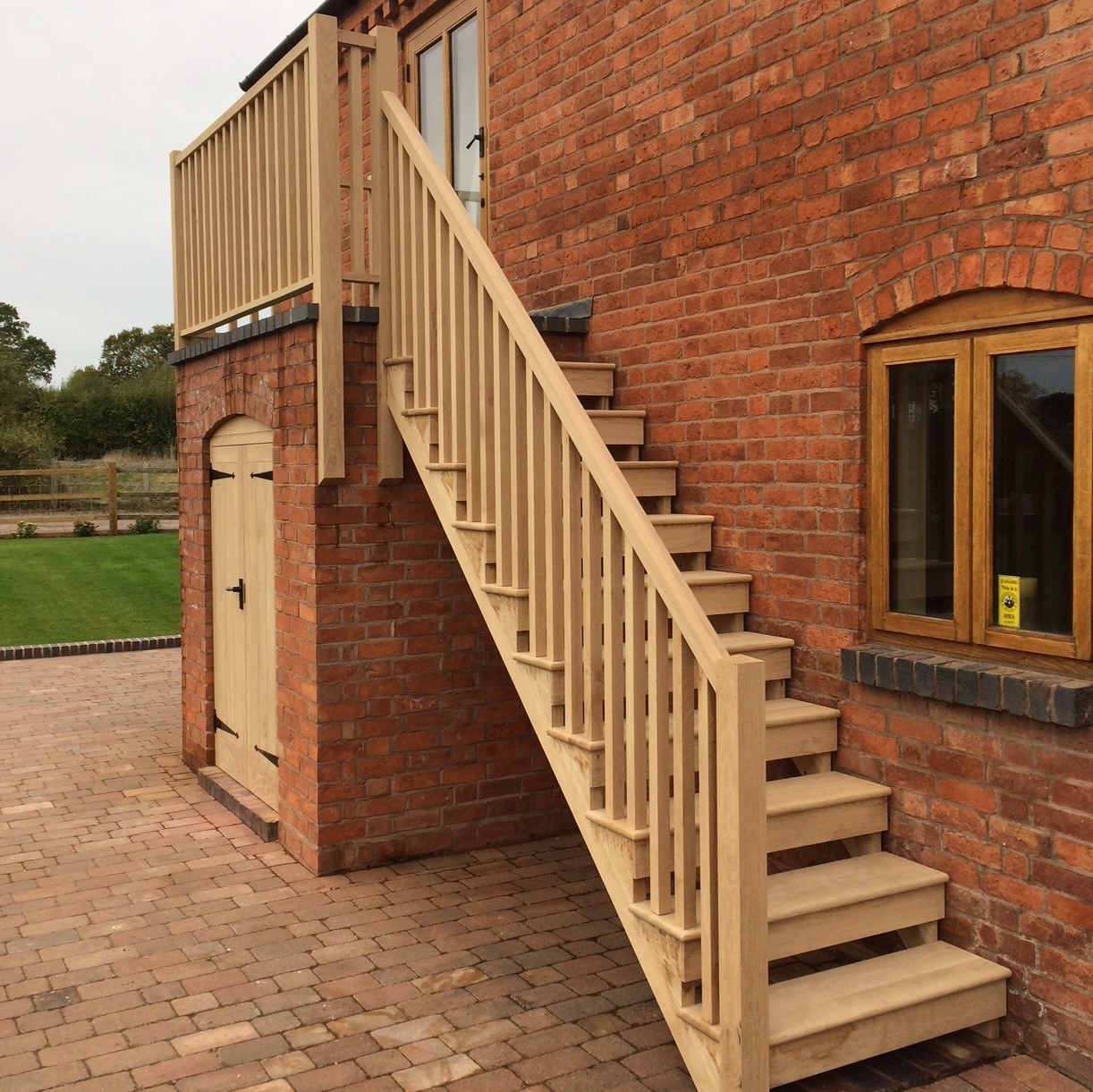 External timber staircase and raised landing