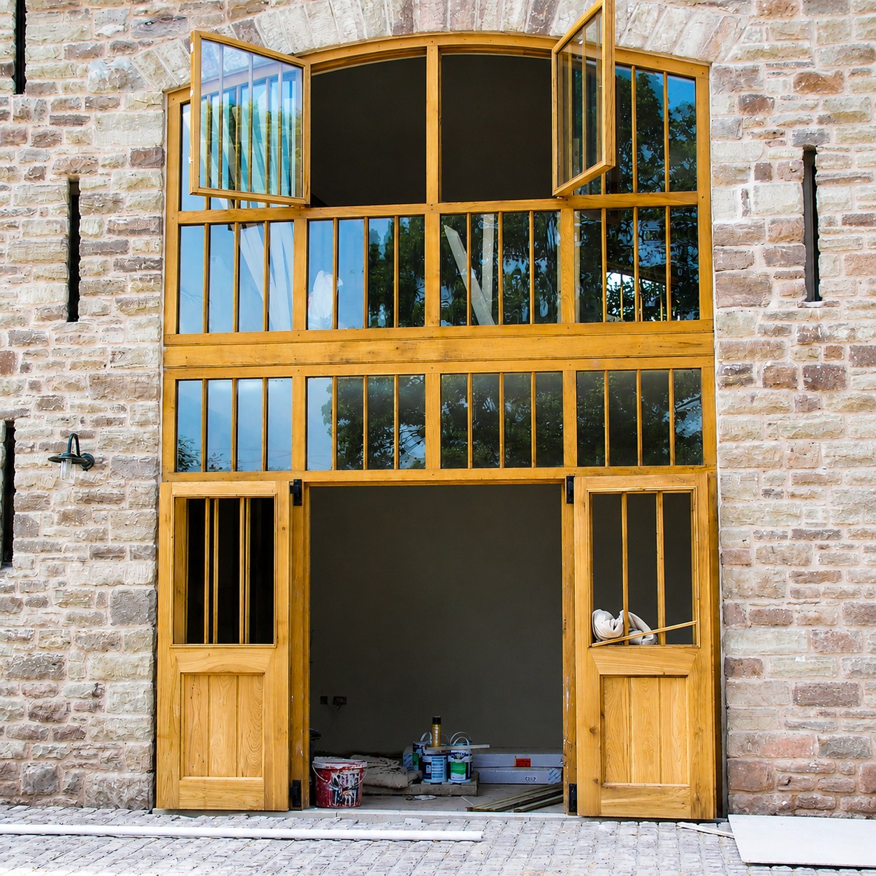 Tall timber glazing and doors during installation