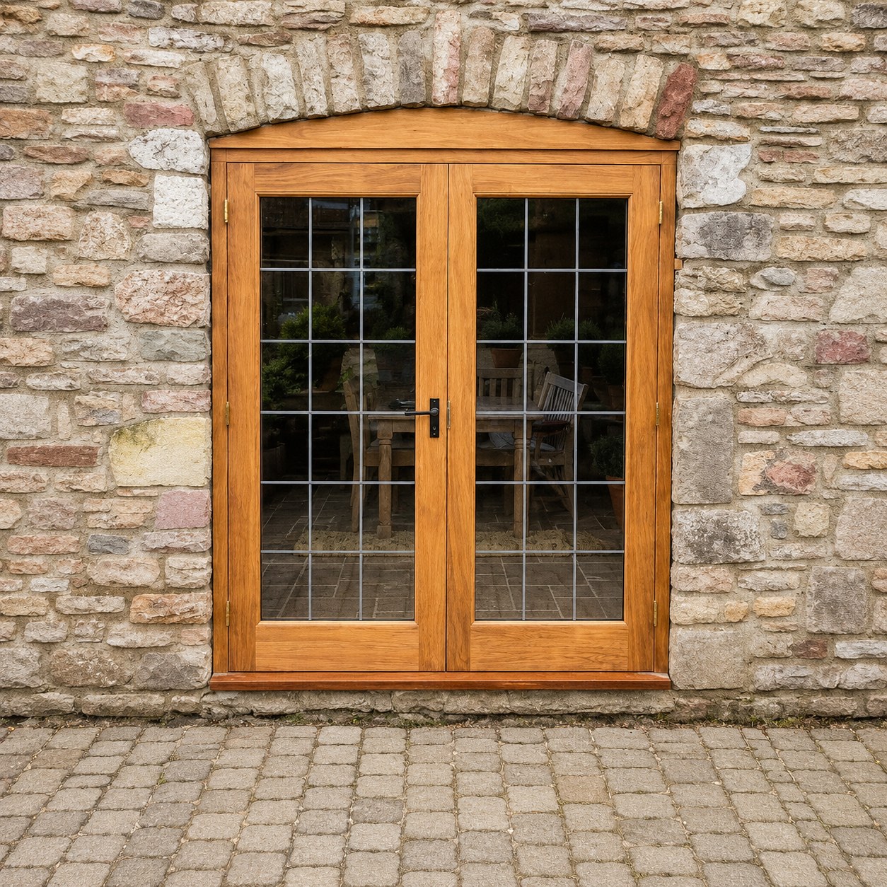 Timber French doors with divided glazing
