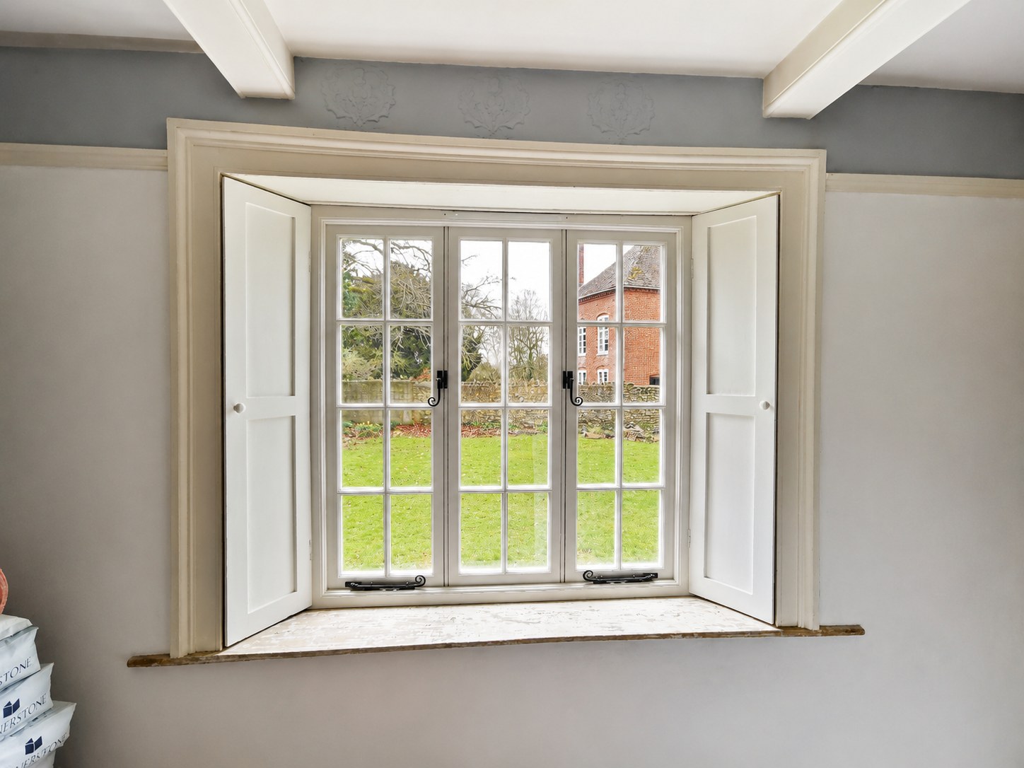 Sash window and panelled reveal viewed from inside