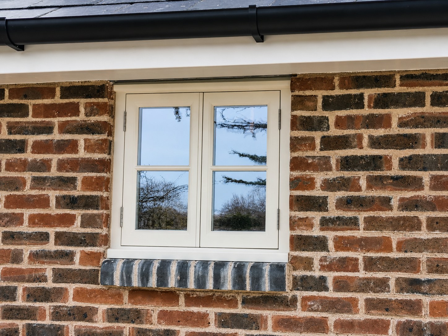 White casement window with divided glazing