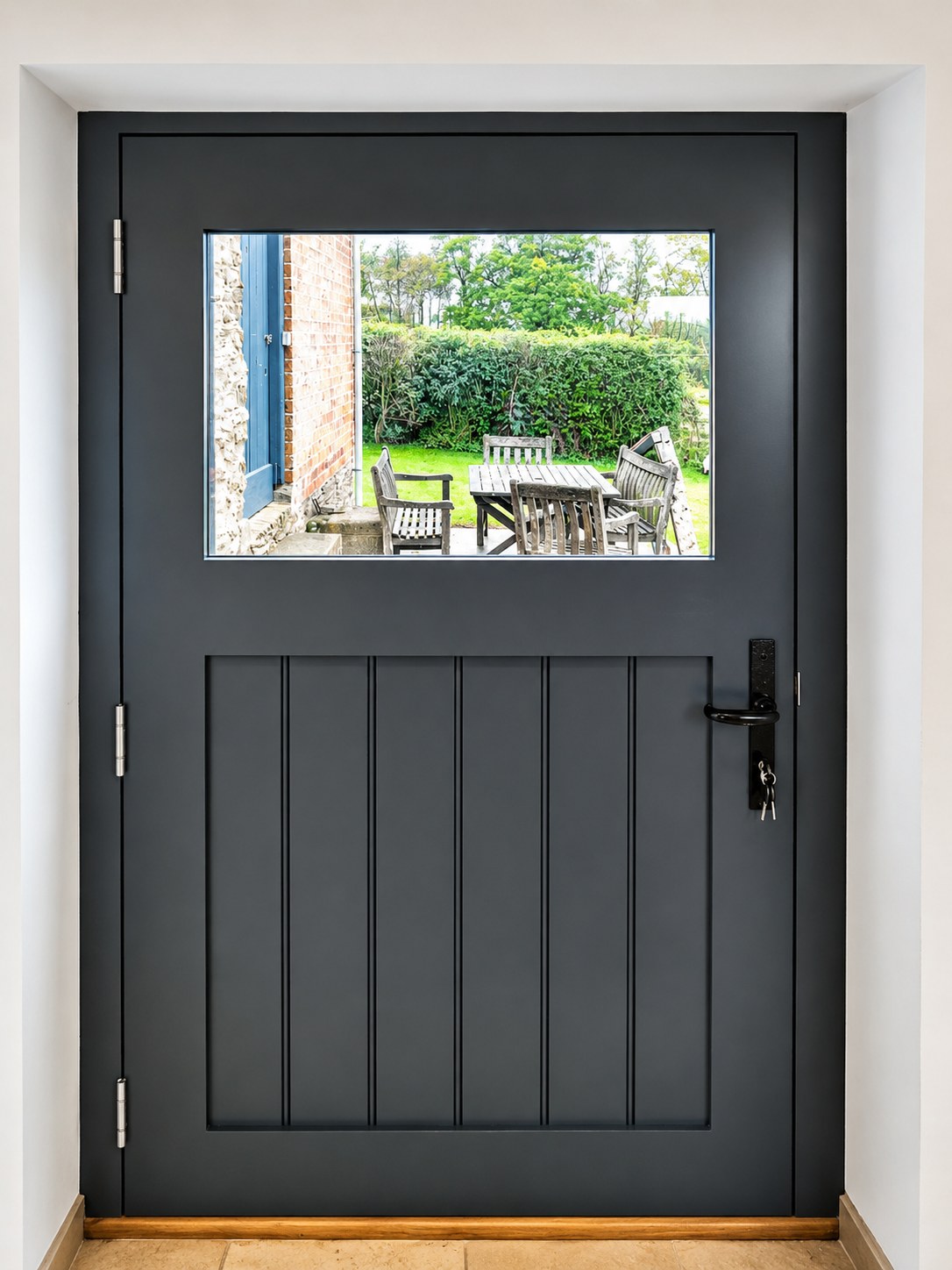 Dark painted stable door viewed from inside