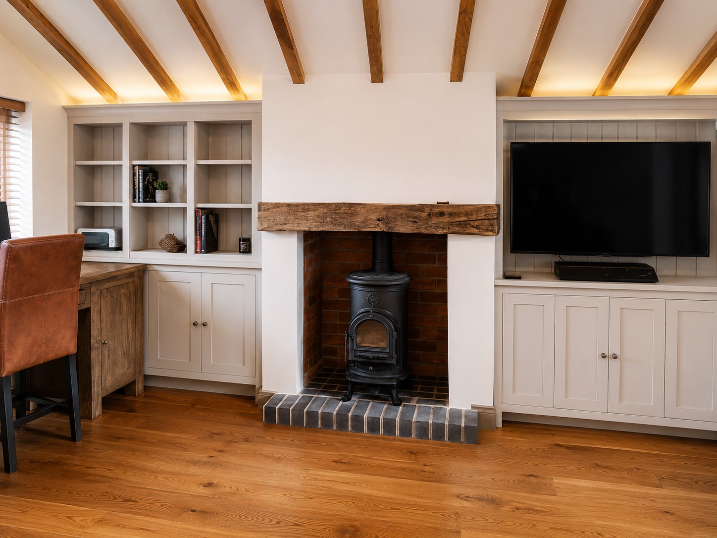 Painted living-room cabinets around a fireplace