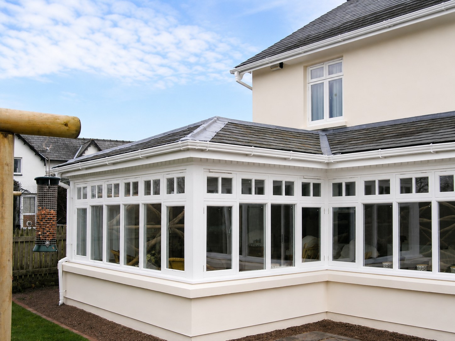 Painted conservatory with divided glazing