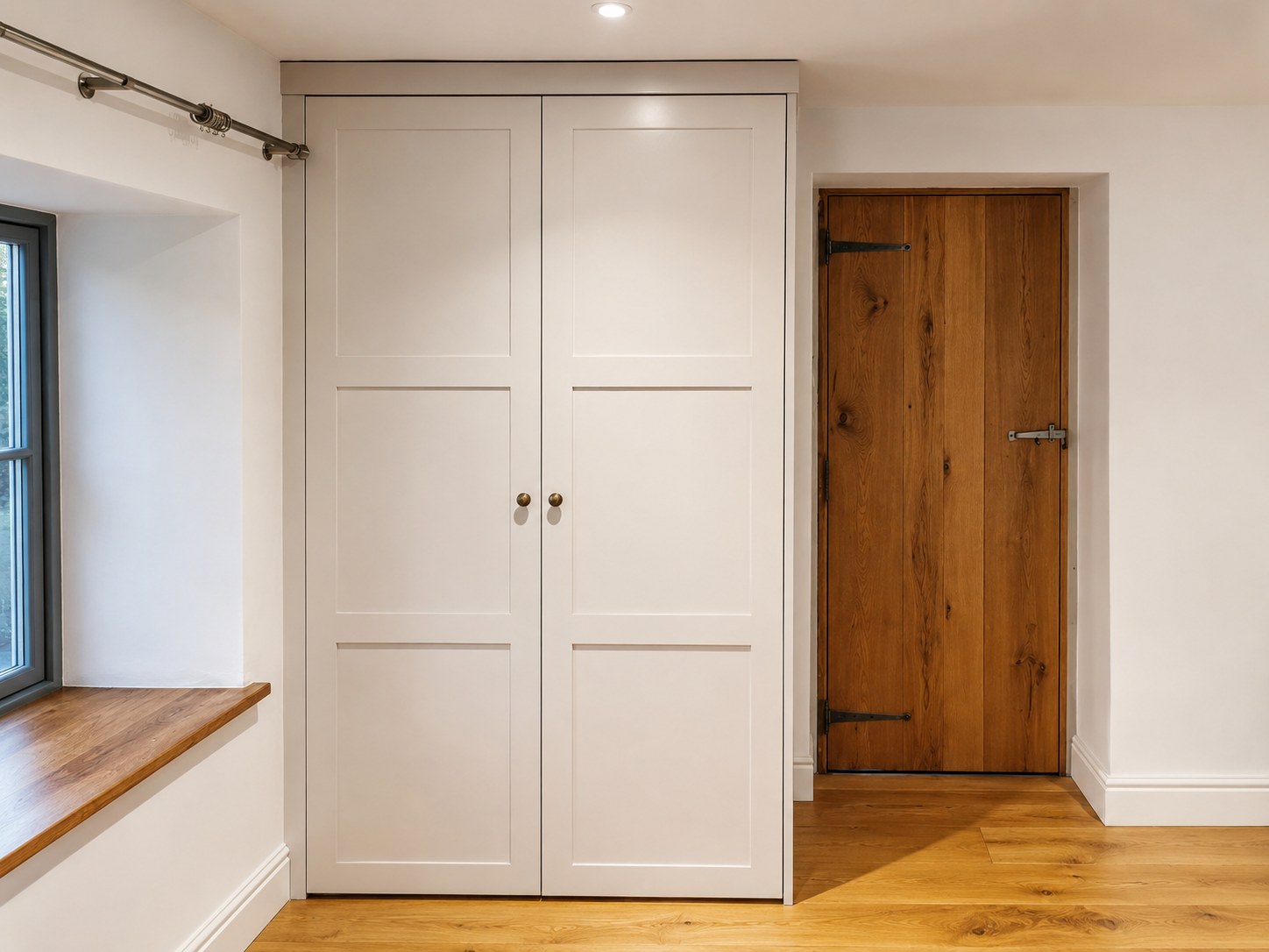 Painted fitted wardrobe with double doors