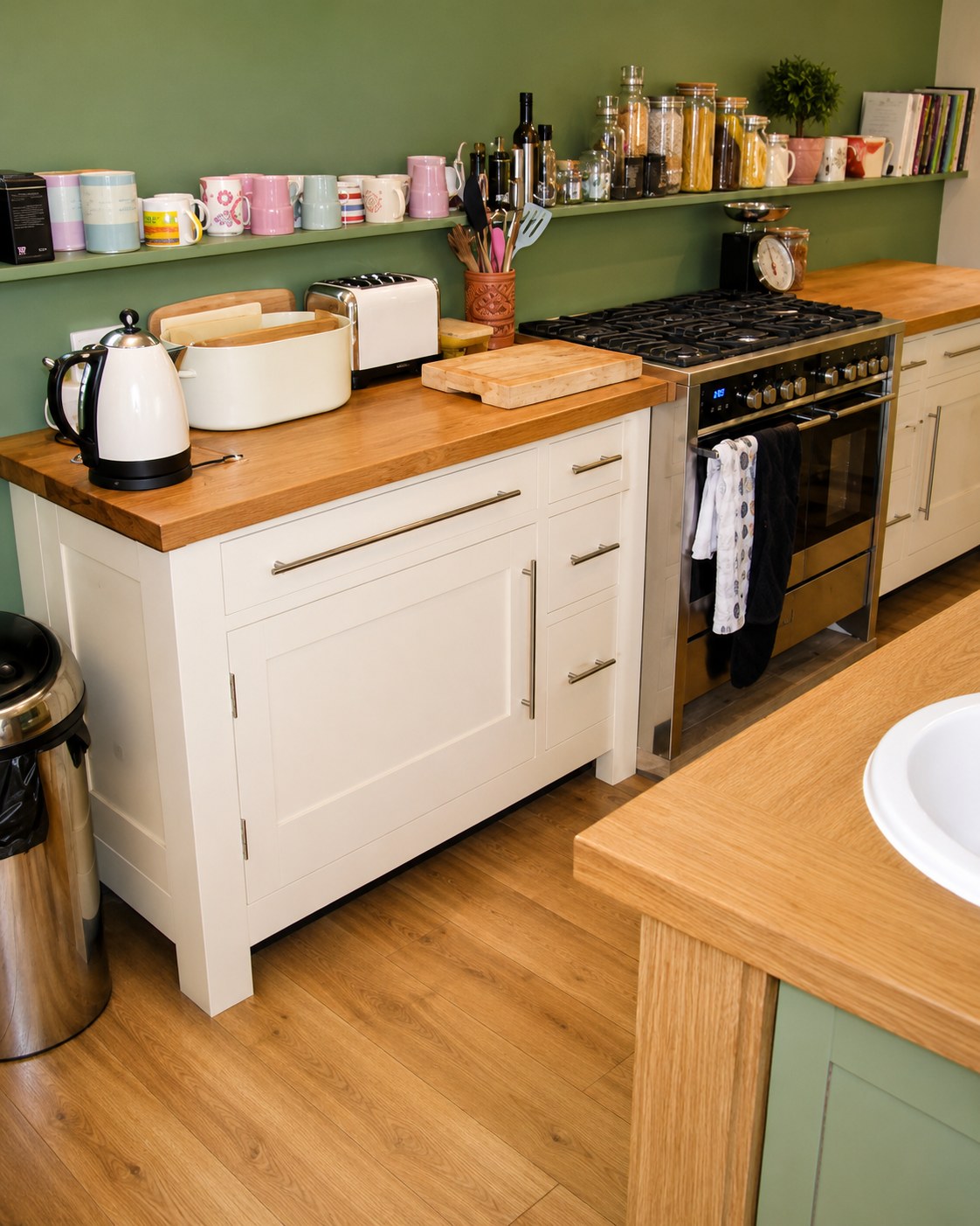 Painted kitchen units with timber worktops