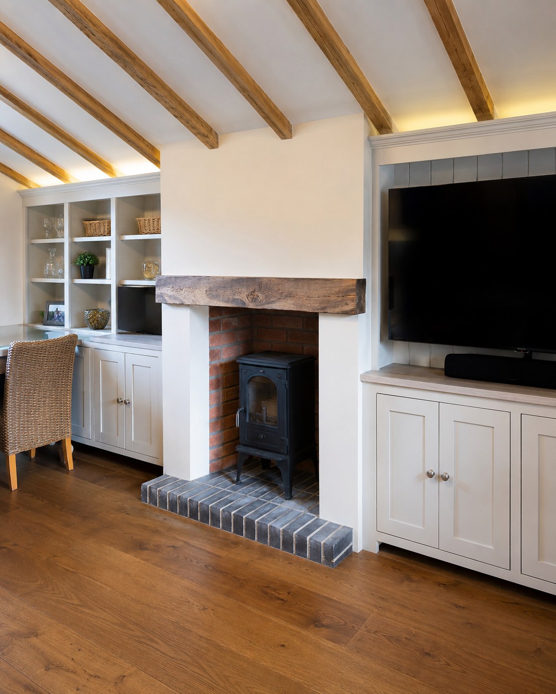Living-room cabinets and shelving around a fireplace