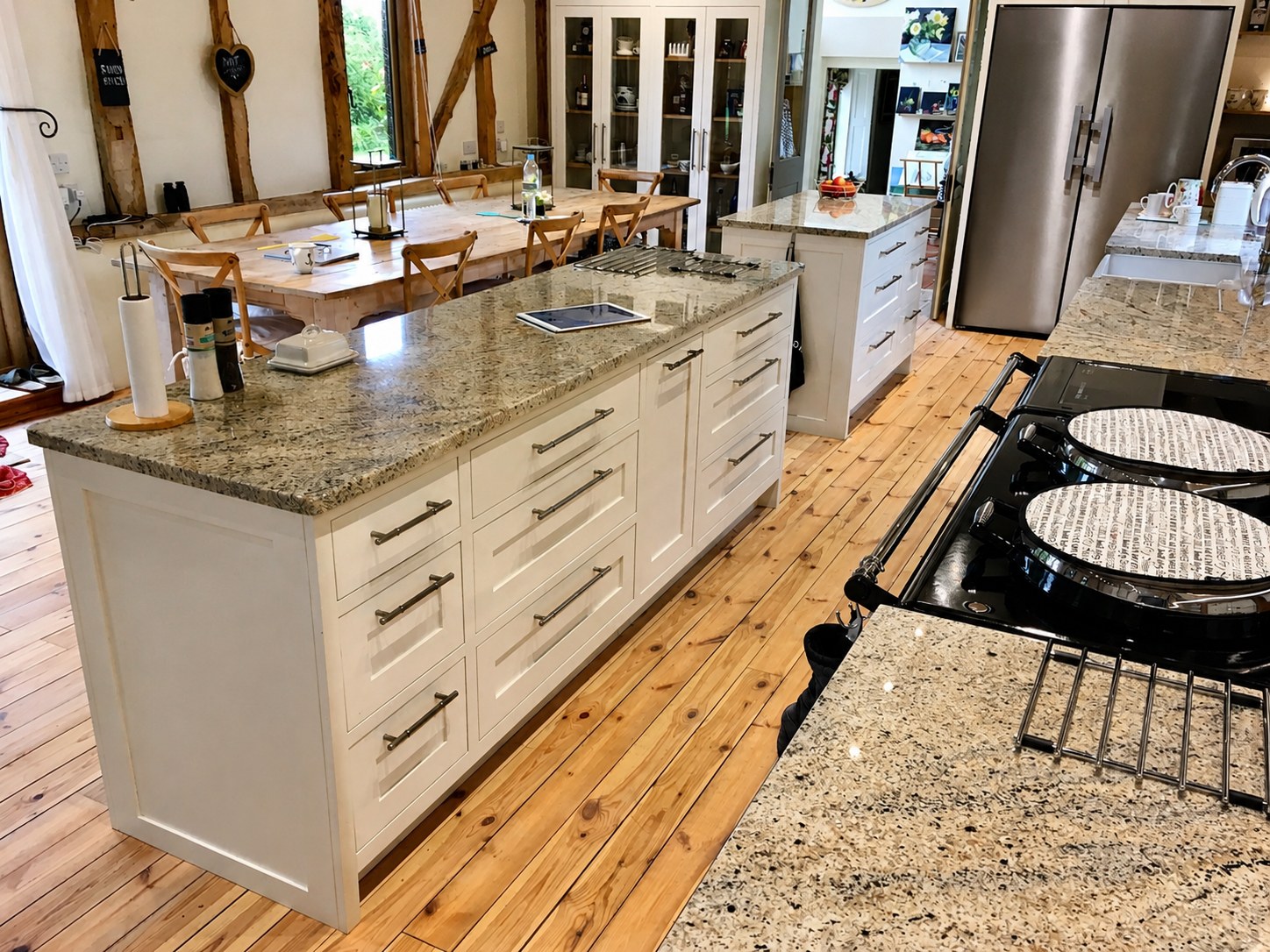 Painted kitchen island with drawers and stone worktop