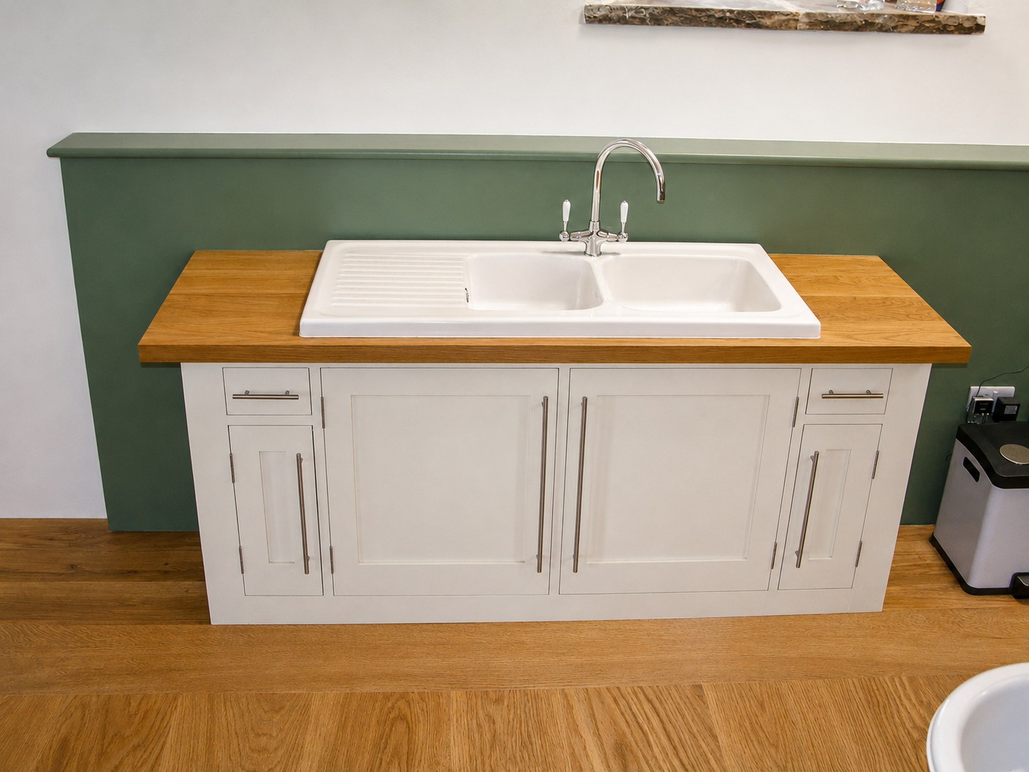 Painted sink cabinet with timber worktop