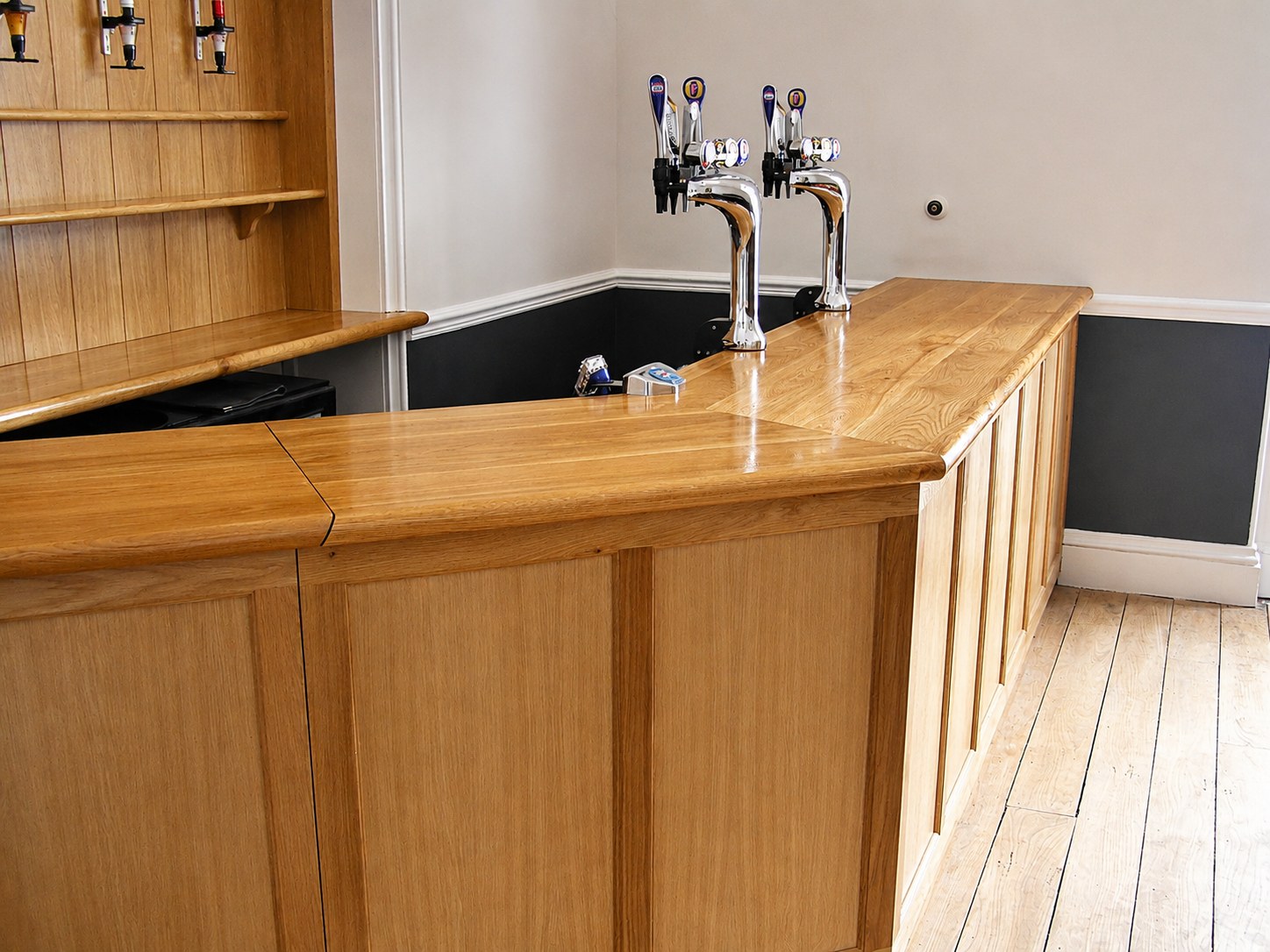Timber bar counter and tap fittings