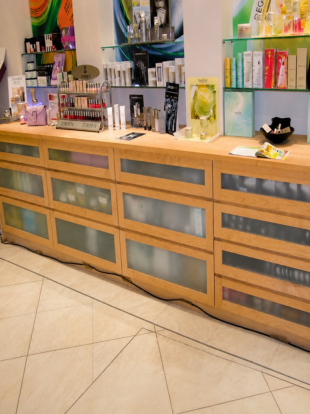 Timber shop counter with glazed display panels