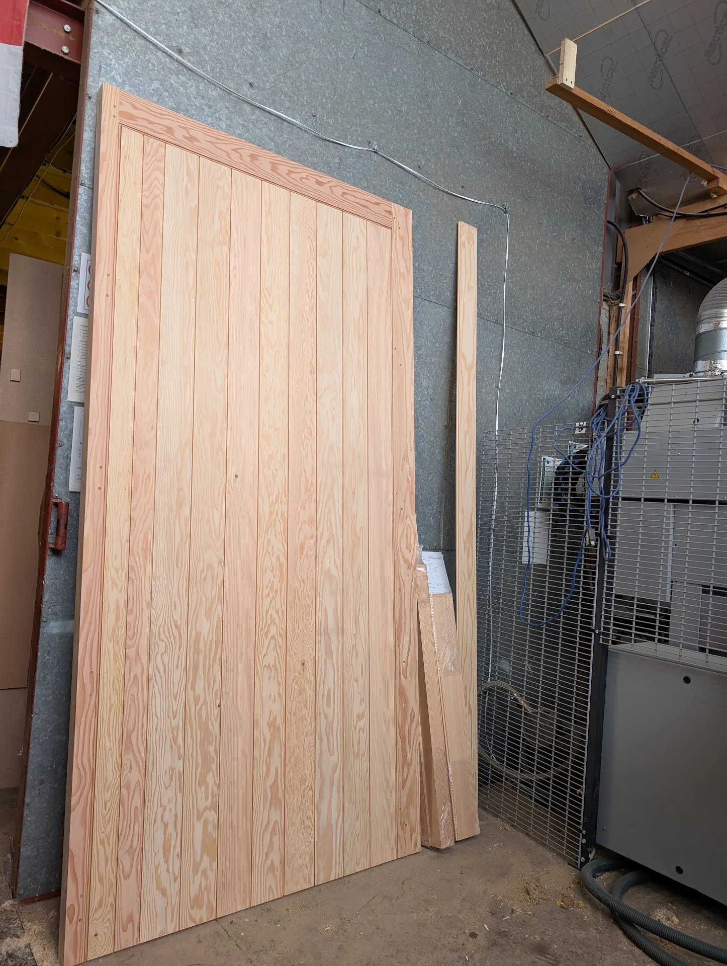 Timber door blank stored in the workshop