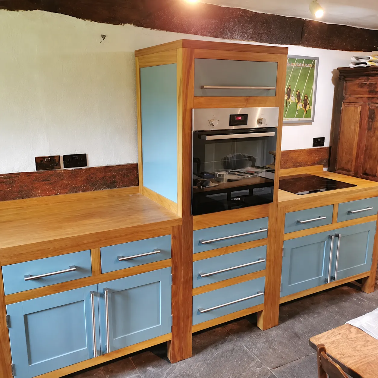 Painted kitchen fronts and timber appliance housing