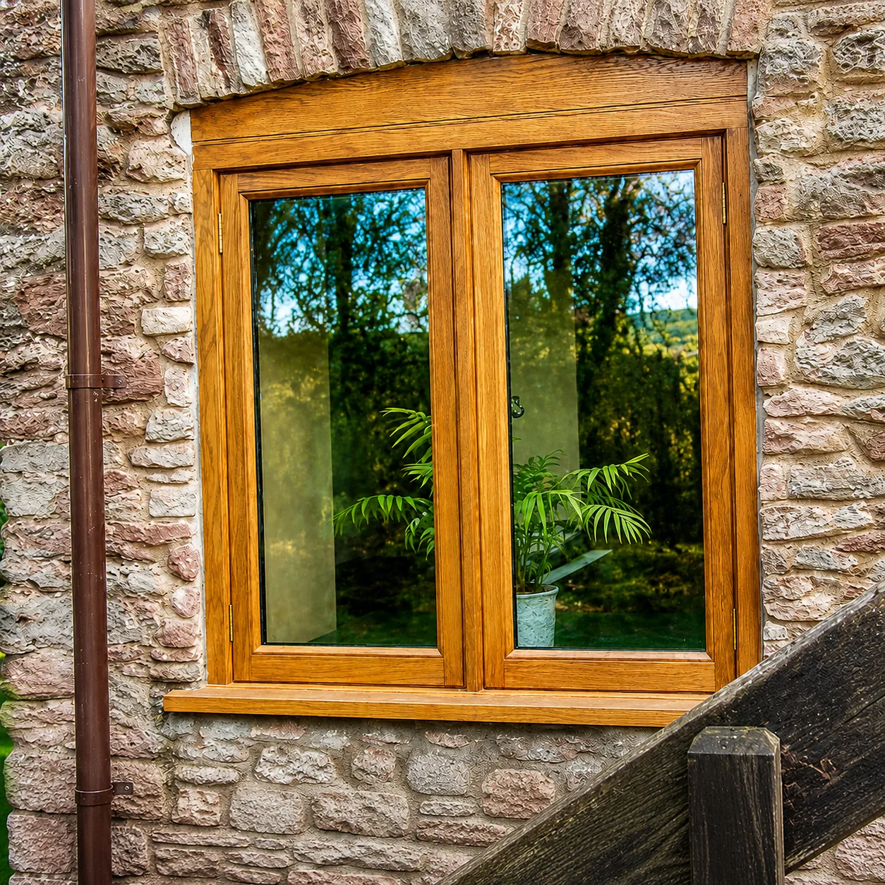 Natural timber window in stone