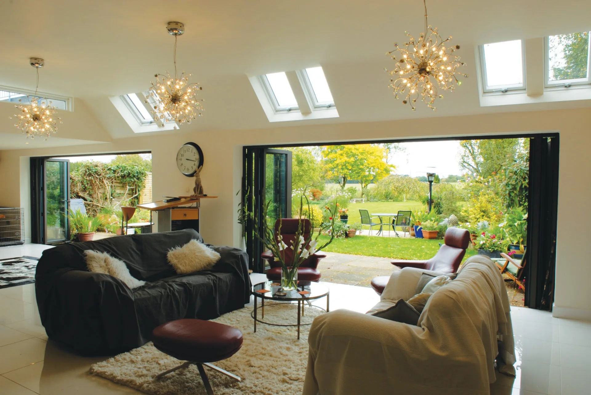 Open aluminium doors to a living space