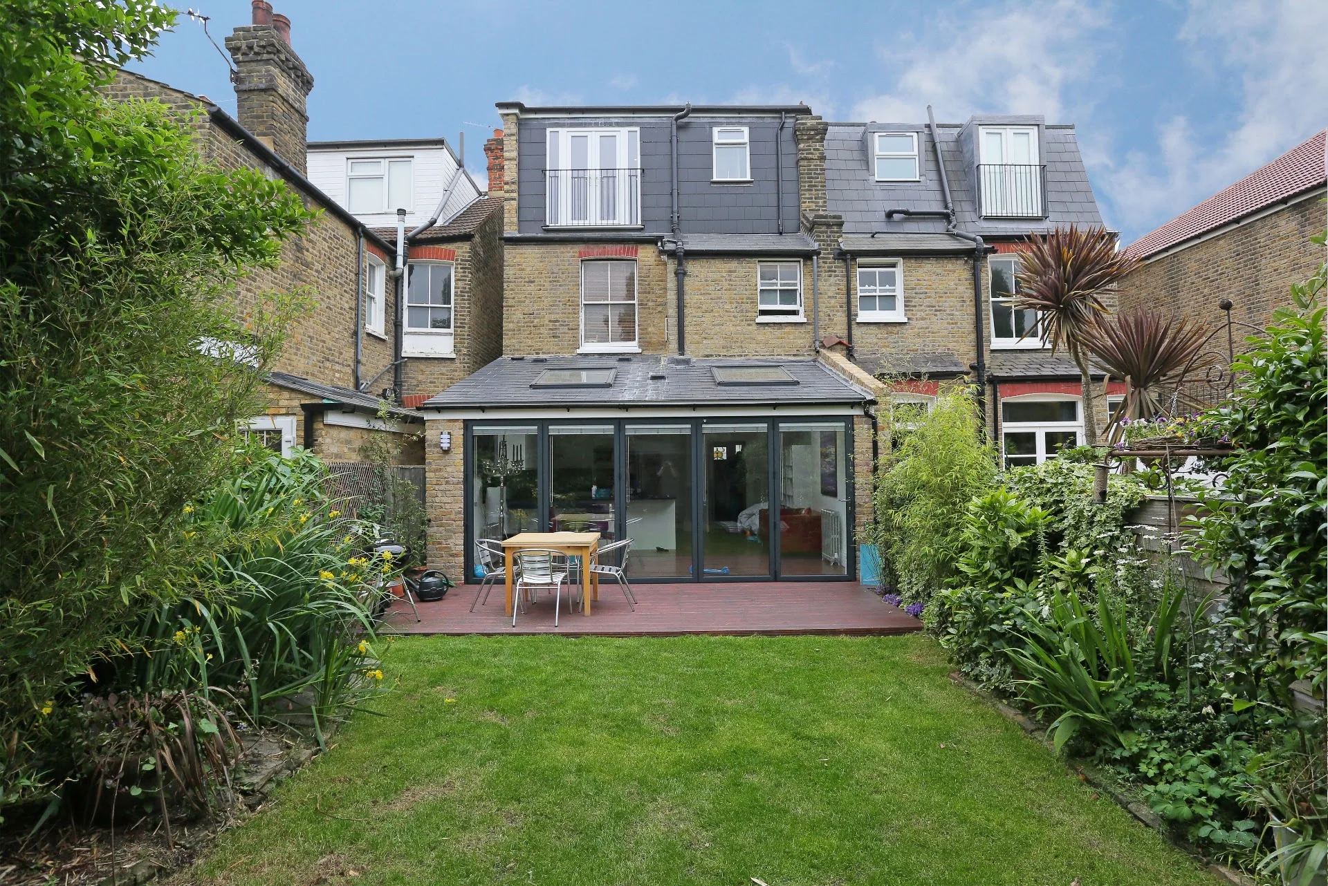 Glazed extension adjoining a period house