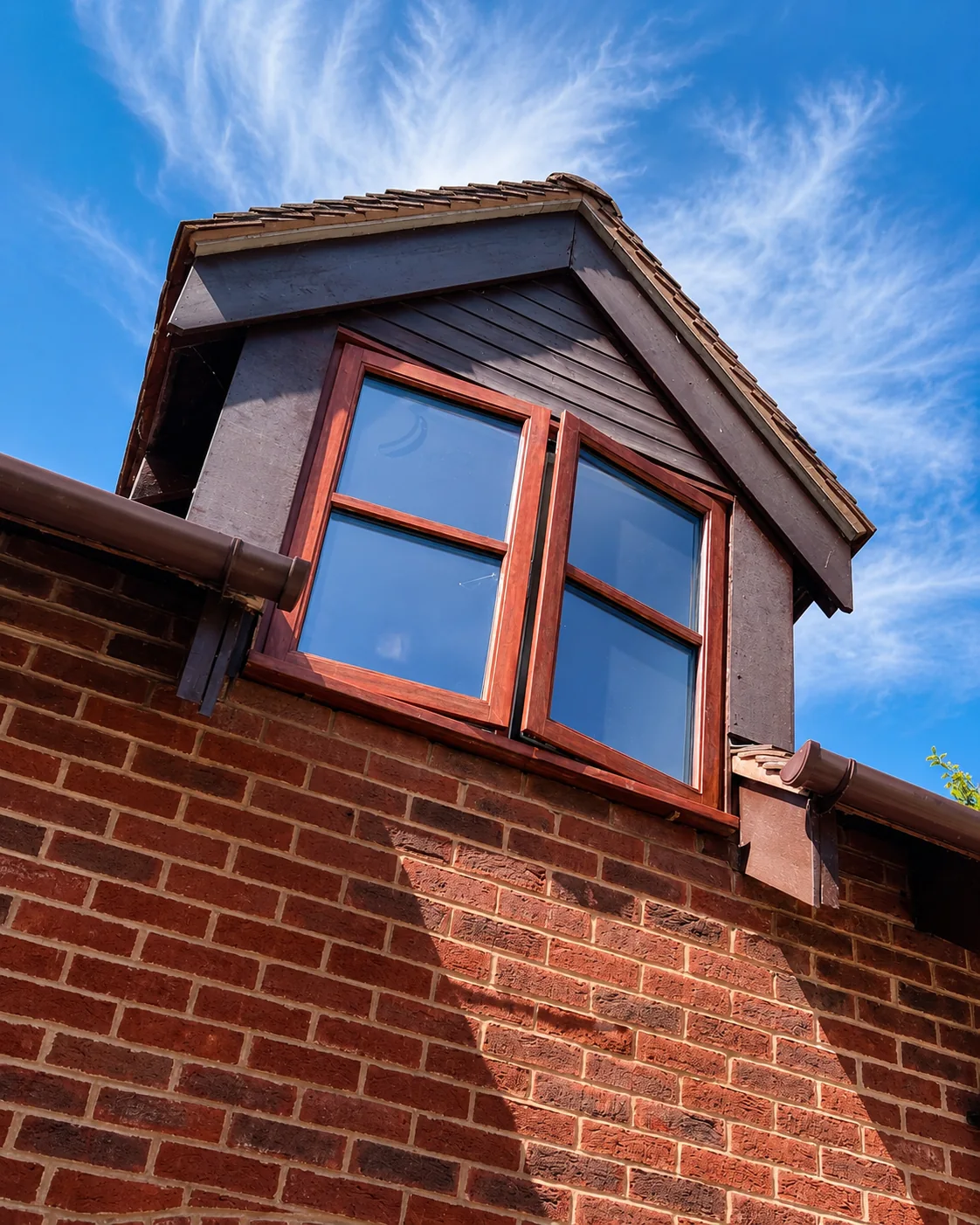 Red painted dormer window