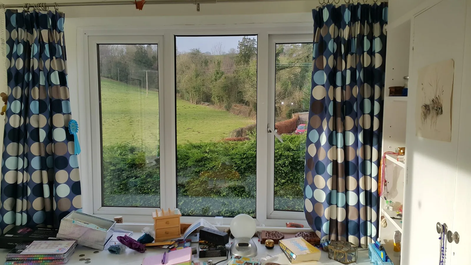 Painted three-part window viewed from inside
