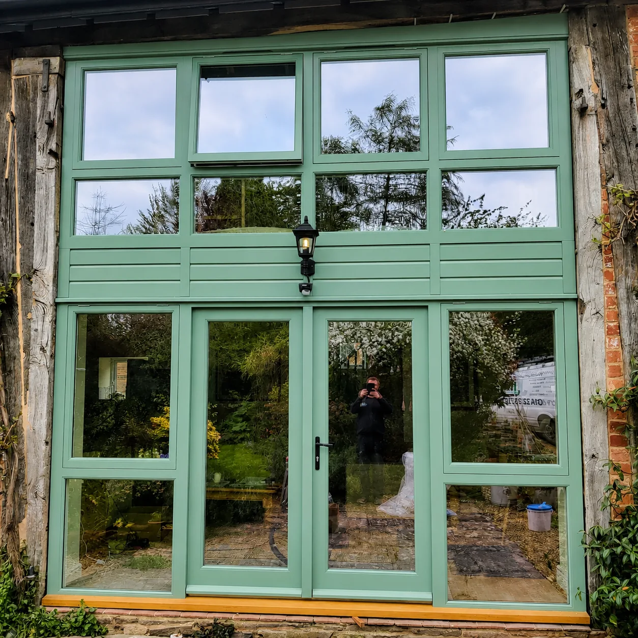 Green timber frame and divided glazing